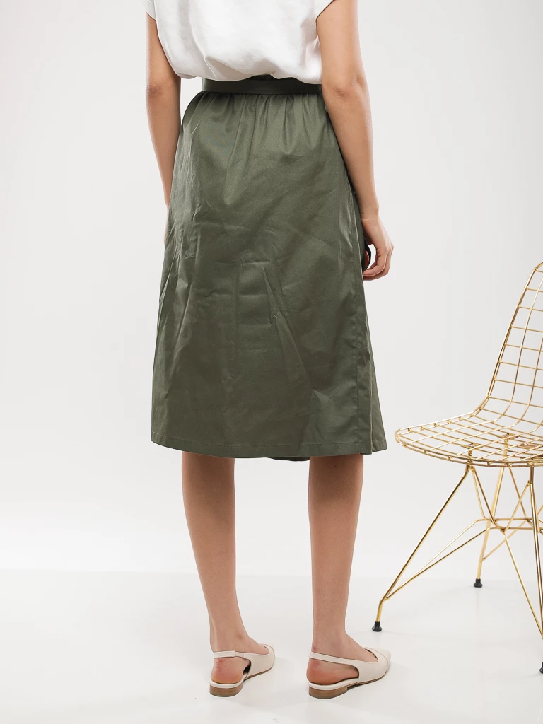 Jupe midi plissée à ceinture nouée