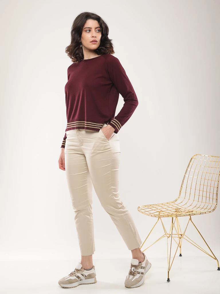 Pull en maille à rayures dorées