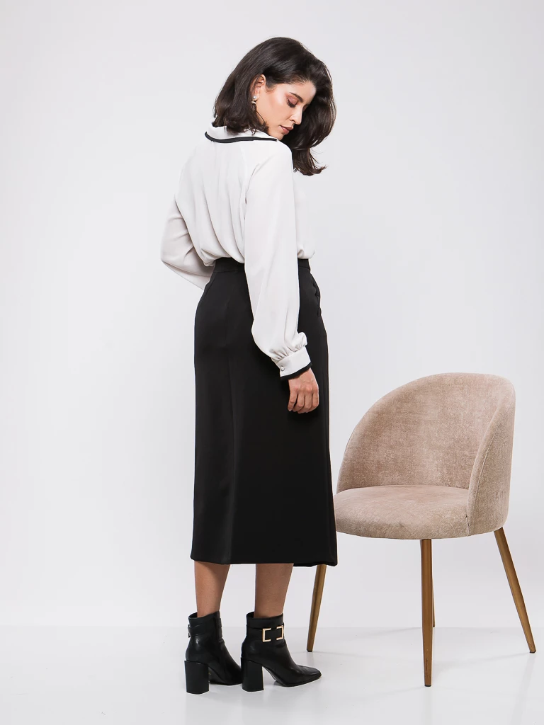 JUPE DROITE A PLI CREUX