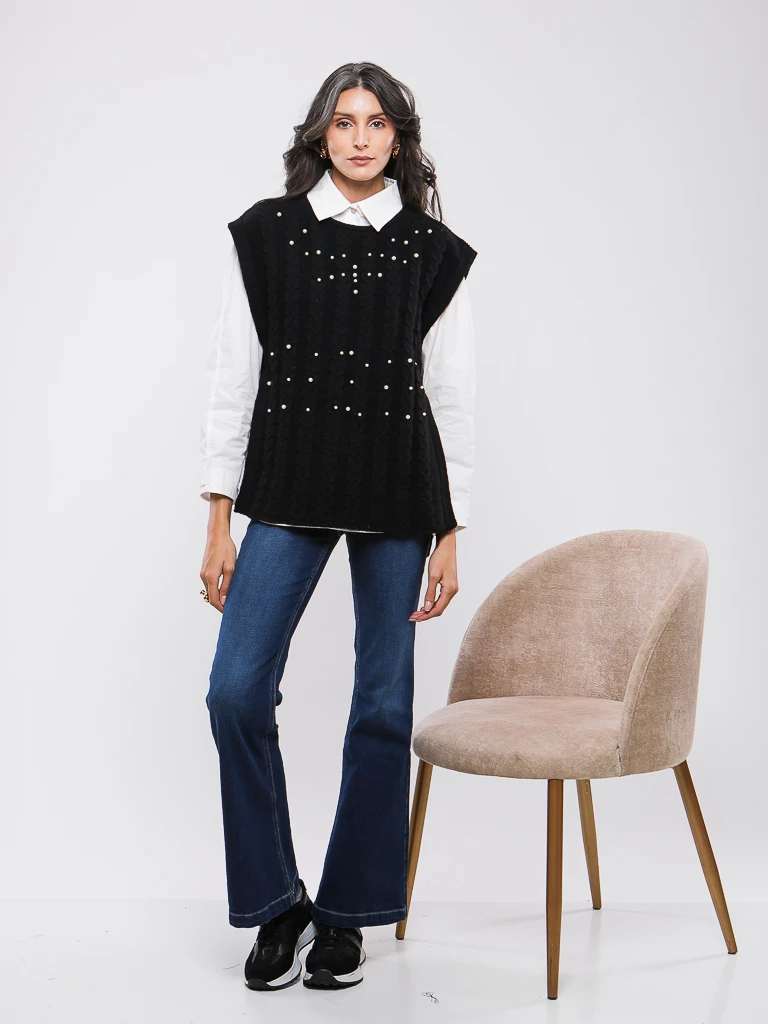 DEBARDEUR EN MAILLE TORSADÉE