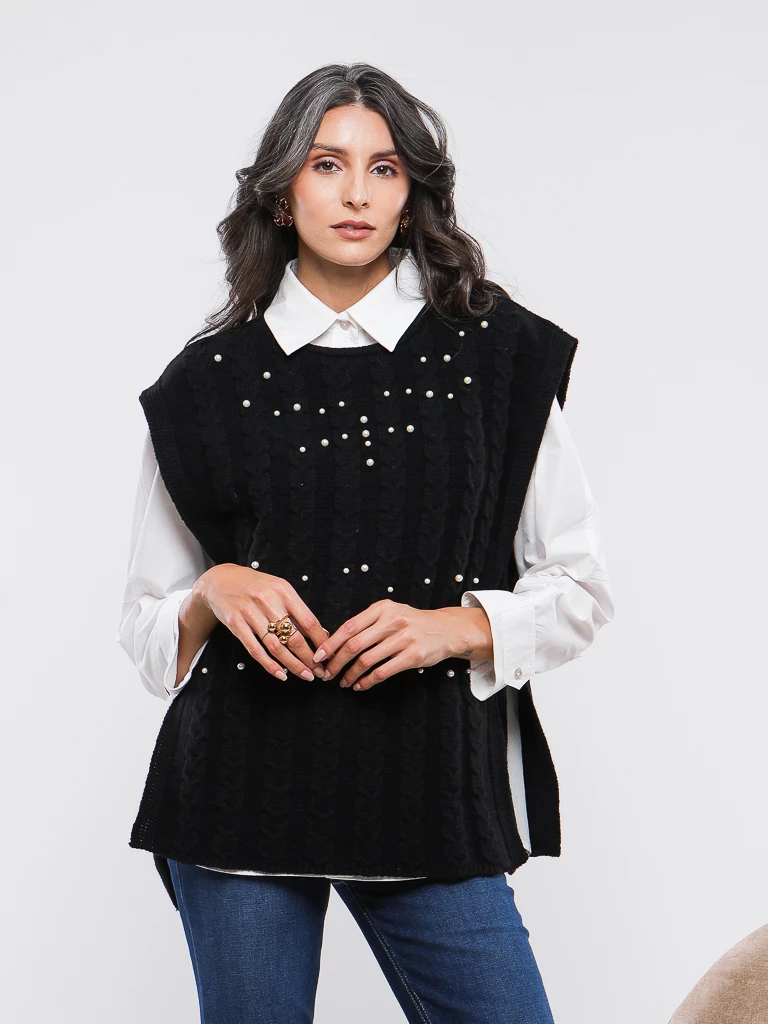 DEBARDEUR EN MAILLE TORSADÉE