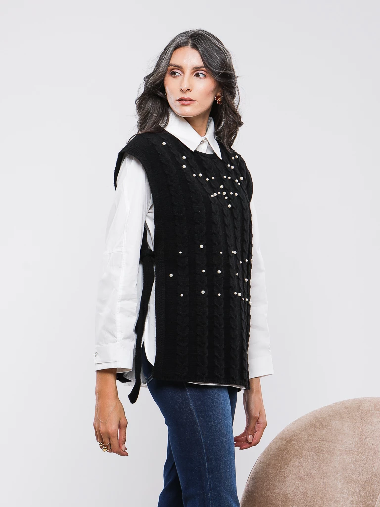 DEBARDEUR EN MAILLE TORSADÉE