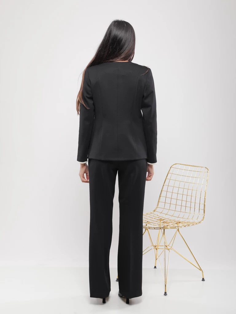 PANTALON FLARE À BOUTONS