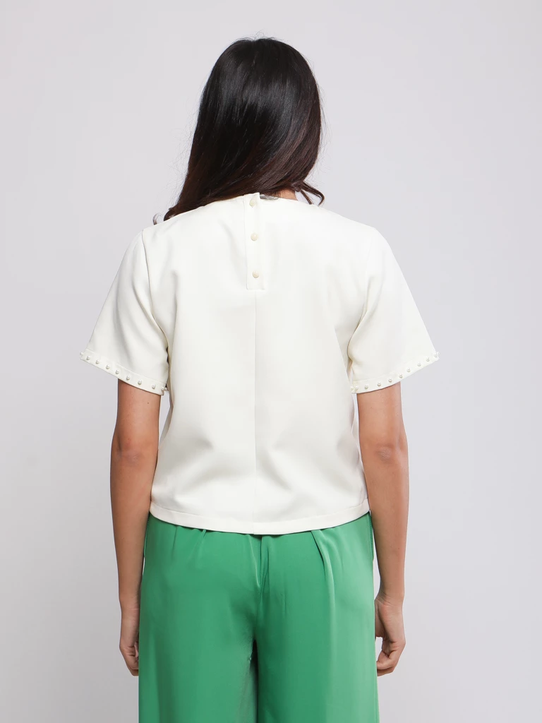 BLOUSE À COL ROND ET DÉTAILS PERLÉS