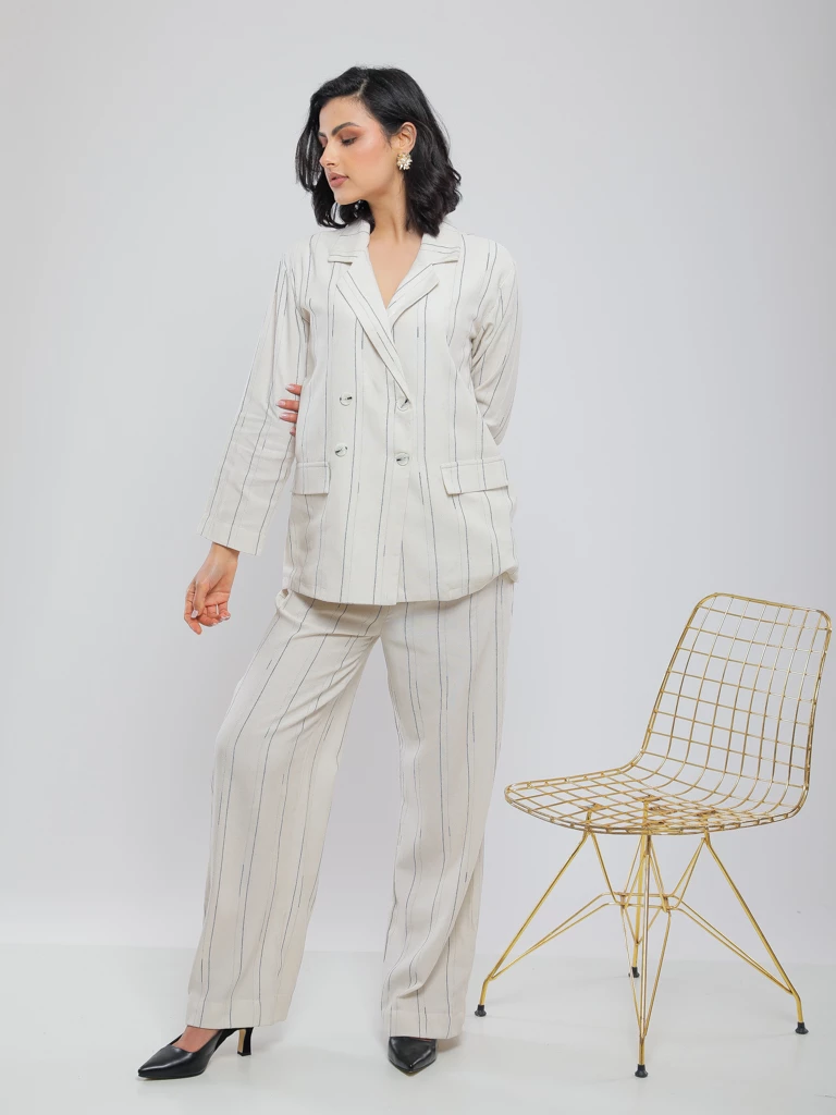 VESTE EN LIN RAYÉE DOUBLE BOUTONNAGE