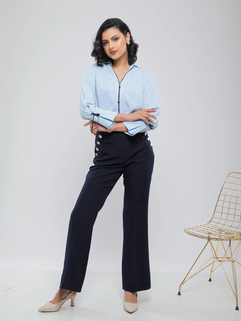 PANTALON LARGE À BOUTONS DORÉS