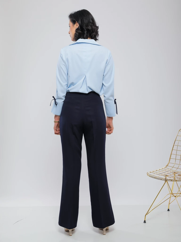 PANTALON LARGE À BOUTONS DORÉS